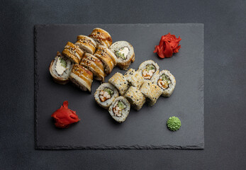 Japanese cuisine. Delicious fried rolls with salmon