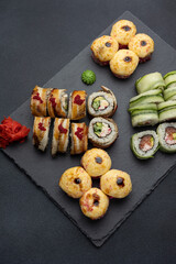 Japanese cuisine. Delicious fried rolls with salmon