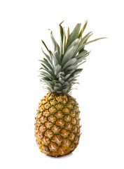 Fresh whole pineapple with green leaves on white background