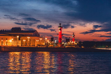 Fototapeta na wymiar Rostral columns on Vasilyevsky island Spit Strelka at white night. St. Petersburg. Russia