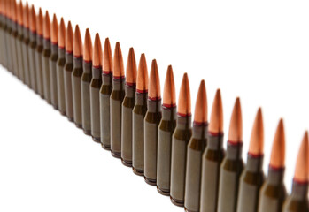 Bullets for firearms, live military cartridges on a white background.