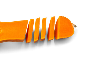 Ripe butternut squash cut into slices, isolated on a white background.