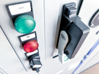 Status lights mounted in the electrical panel door inside of a motor control center