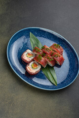 Japanese cuisine. Tuna avocado sushi hand rolls