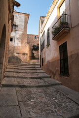 Fototapeta na wymiar Narrow streets and Facades of historic houses in Caceres city