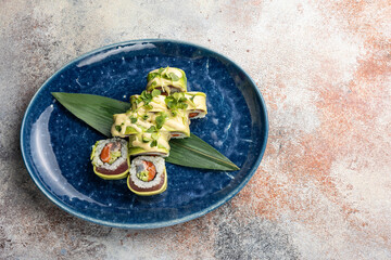 Japanese cuisine. Tuna avocado sushi hand rolls