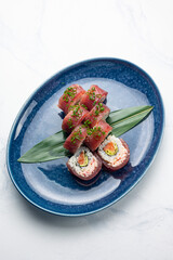Japanese cuisine. Tuna avocado sushi hand rolls