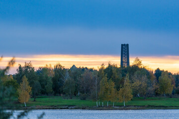 The tower on the Bistumshöhe behind the Lake Cospudener Lake in Leipzig, Germany