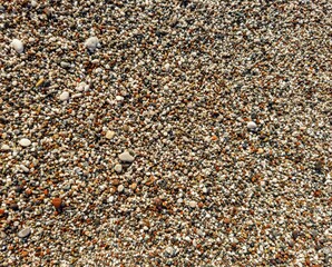 Pebble stones texture, little gravel background