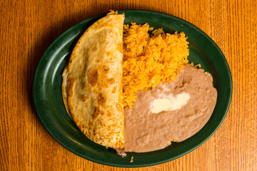 Quesadilla with refried beans and rice