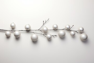 Elegant White Pearls Adorning a Delicate Branch