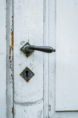 Old door handle with patina
