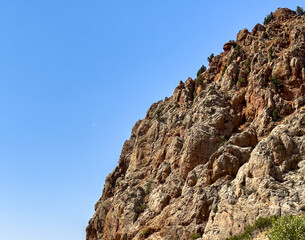 Fototapeta premium Nature landscape with rock cliff and sky background