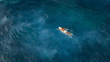 Surfer in Deep Ocean Hawaii