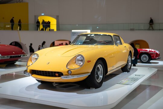 Yellow Ferrari 275 GTB 4 vintage retro vehicle in Enzo Ferrari Museum in Modena