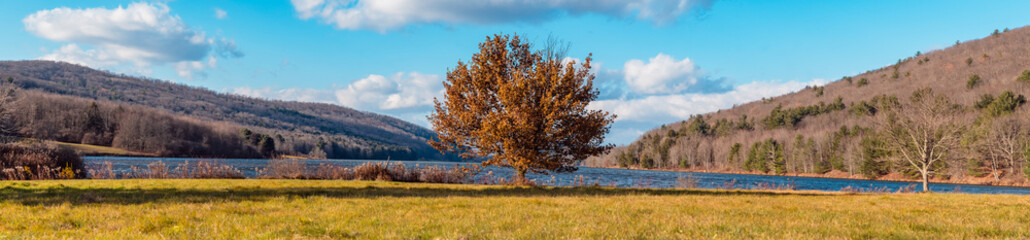  mountain valley landscape late fall weather, sunny windy day