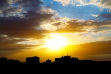 Fototapeta premium Dramatic sky at sunset with red, yellow, orange, blue and colors.