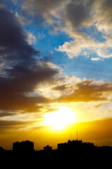 Dramatic sky at sunset with red, yellow, orange, blue and colors.