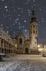 Romanesque St Andrew church on Kanonicza street during snowy night, Krakow, Poland
