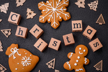 Beautiful Christmas composition with copy space with an inscription in wooden cubes
