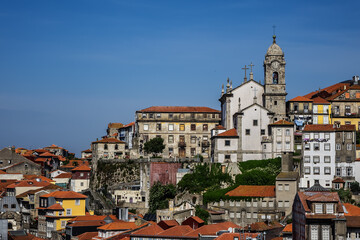 Fototapeta na wymiar Panoramic view of the picturesque multicolored buildings in the historic center of the Porto city. Porto, Portugal.