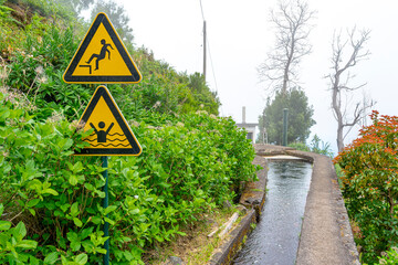 completion zone of the levada or irrigation channel, ending up in a water tank, Madeira island. ...