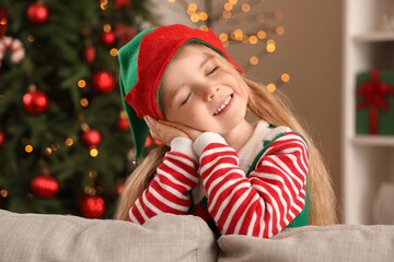 Dreaming little elf at home on Christmas eve