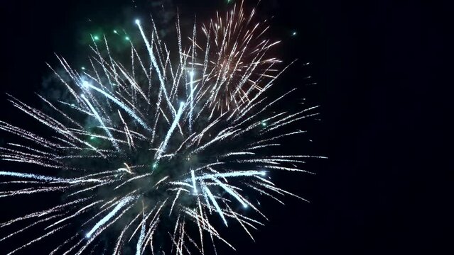 Best beautiful color fireworks in night sky. Slow motion. Loop, sparks, show, event, party, festive, holiday, effect, bright, light, flash, shiny, fun, dark, glow, view, display, hd. ProRes 422 HQ