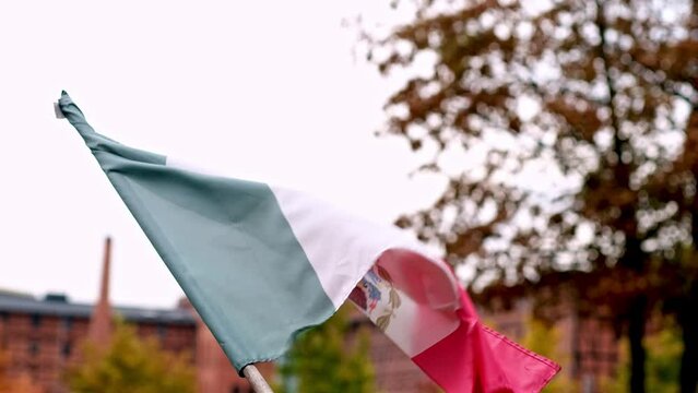 Mexican Flag Waving On A Flagpole Paints Vibrant Picture Of Patriotism