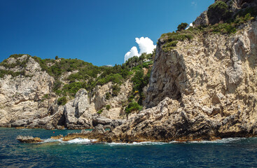 Fototapeta na wymiar Rocky coats of west part of Corfu Island near Paleokastritsa village in Greece