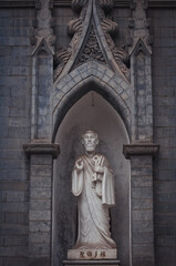 Statue on a facade of Church of Saint Michael in Beijing, China