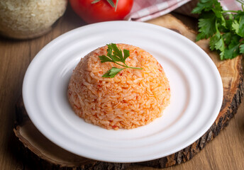 Traditional delicious Turkish food; rice pilaf with tomatoes (Turkish name; Domatesli pirinc pilavi)