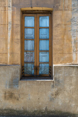 Detail of a wall with closed window