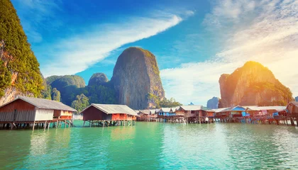 Foto op Canvas View of a fishing village in Thailand. Village on the water, cottages on stilts. Sea Gypsies in Phang Nga Bay. An exotic tourist destination © Donald