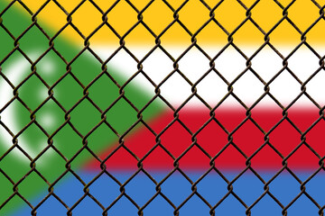 Fototapeta premium A steel mesh against the background of the flag Comoros.