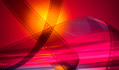 color cinematographic background with film strip. premiere show business film production...
