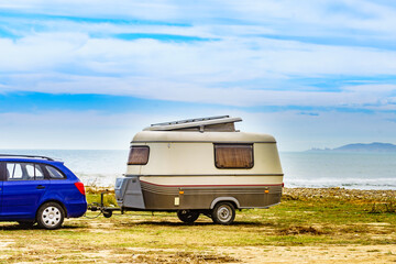 Caravan trailer camping on coast, Spain.