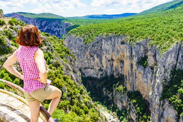 Woman enjoying mountain view, Verdon Gorge in France.