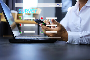 Businessman answer online questionnaire as a organization survey or company to feedback satisfaction or information to provide guidelines for future business investment and operation - obrazy, fototapety, plakaty