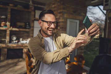 One man happy caucasian male use smartphone selfie photo or video call