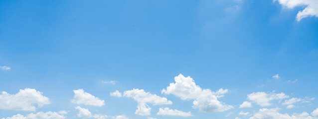 Blue sky background with tiny clouds.Beauty clear cloudy on summer blue sky background.Panorama and...