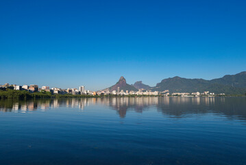 Fototapeta na wymiar Beautiful View of Rio de Janeiro Mountains Reflected in Water of Rodrigo de Freitas Lagoon