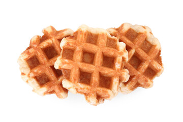 Many delicious Belgian waffles isolated on white, top view