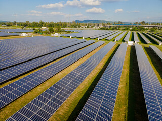 Sun power solar panel field in Thailand in the evening light, Solar panels Energy Transition in...