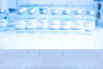 The wooden table is empty and laboratory background