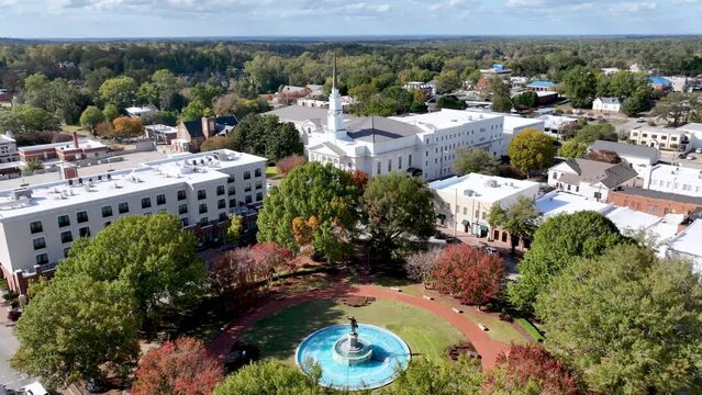LaGrange Georgia aerial push in in Fall with Autumn Leaf Color