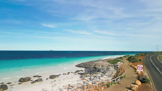 Rising Aerial View over Cape Leeuwin Coastline Paradise Beachs with Crystal Waters and a Road, Australia