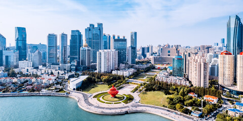 Aerial photography of the coastline and skyline of Qingdao May Fourth Square, Shandong, China