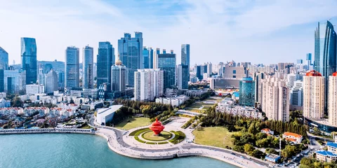 Tableaux ronds sur plexiglas Skyline Aerial photography of the coastline and skyline of Qingdao May Fourth Square, Shandong, China