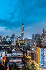 Fototapeta na wymiar Night view of Zifeng Tower city skyline in Nanjing, Jiangsu, China